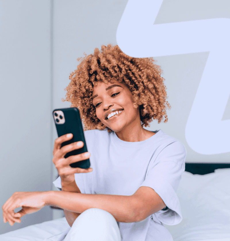 woman looking at her phone